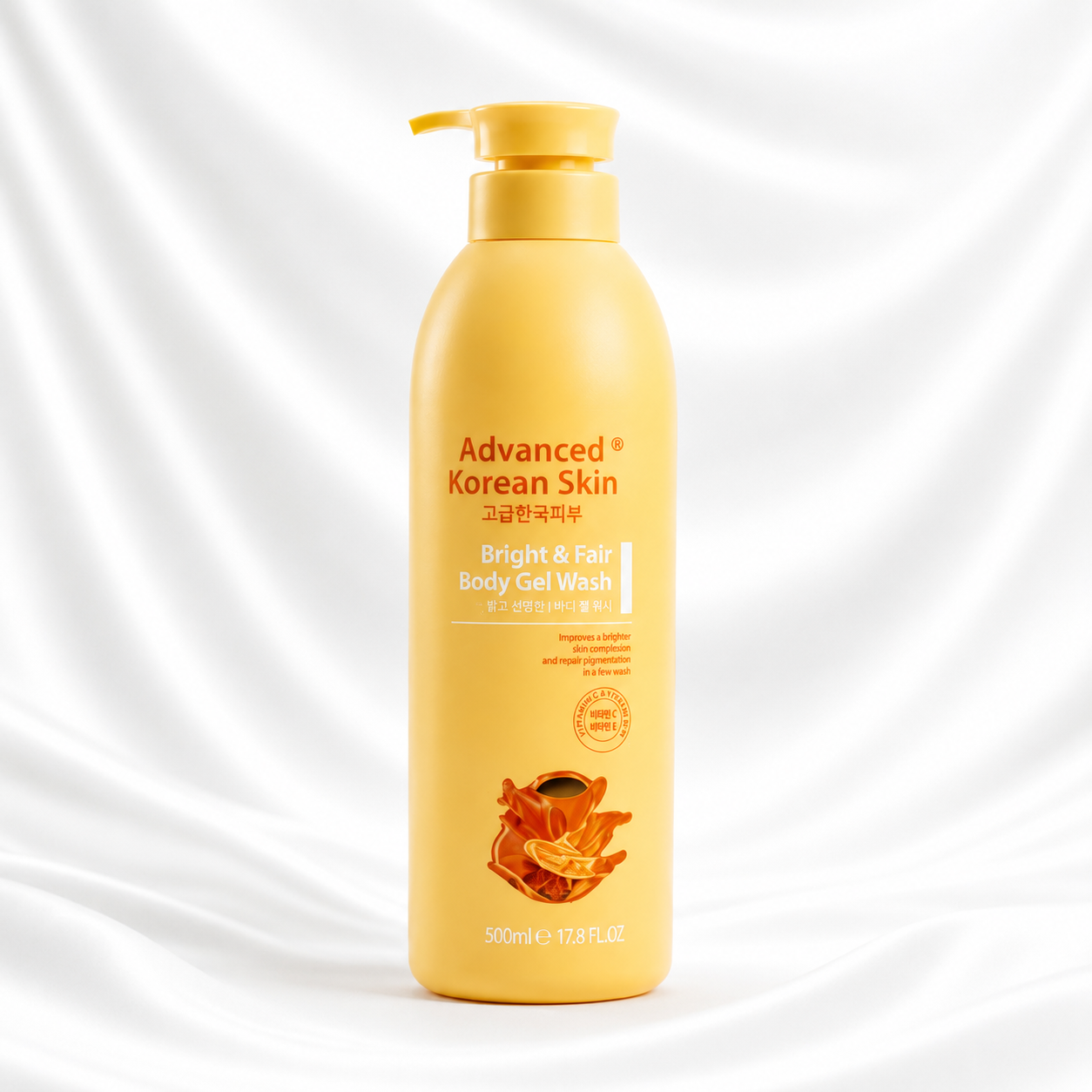 A 1200ml pump bottle of Advanced Korean Skin Bright & Fair Body Gel Wash, featuring a bright yellow-orange colour with a floral graphic near the bottom, set against a white draped fabric background.