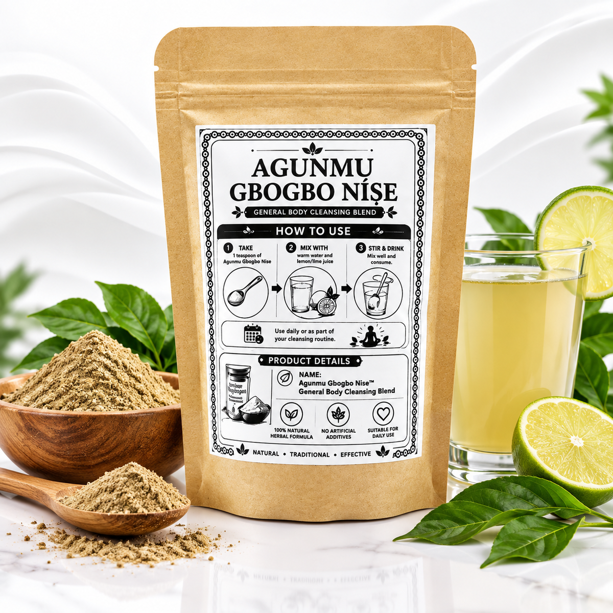 A kraft paper pouch labeled 'AGUNMU GBOBO NISE' stands on a white marble surface with bowls of loose powder, a glass of pale yellow liquid, and lime slices around it. The front label includes usage instructions and product details.