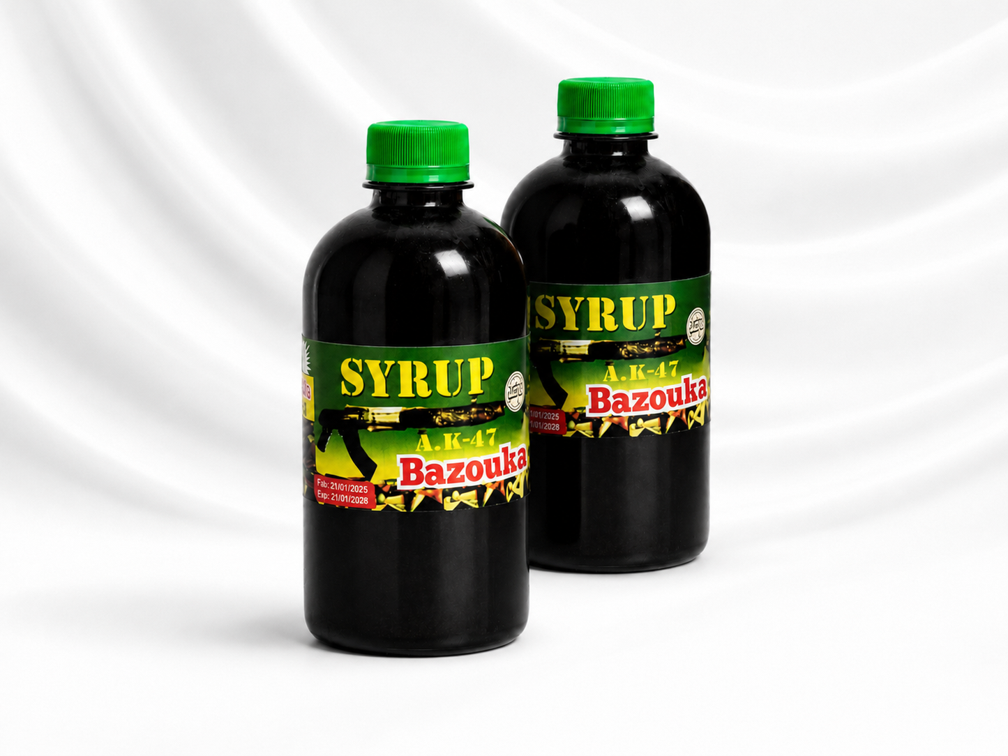 Two dark glass bottles of Agit Bazouka syrup with green caps and green/yellow labels, shown on a white draped background.