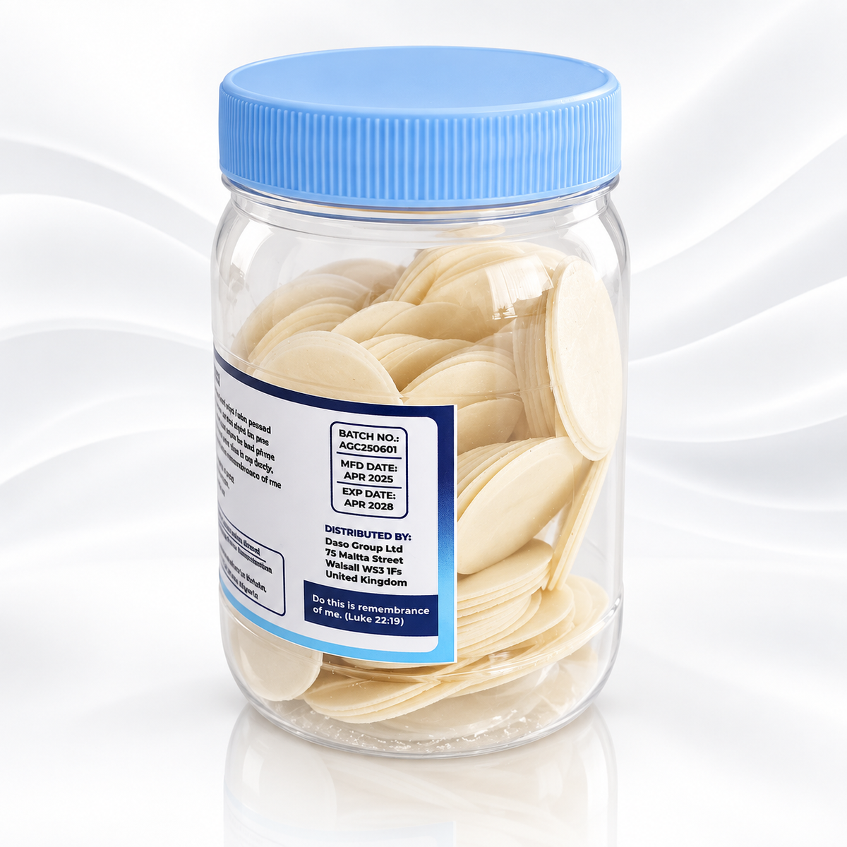 A clear plastic jar filled with round, off-white adhesive pads or patches, sealed with a light blue screw-on lid and a white-and-blue label. The jar is photographed on a clean white background with a subtle reflection.
