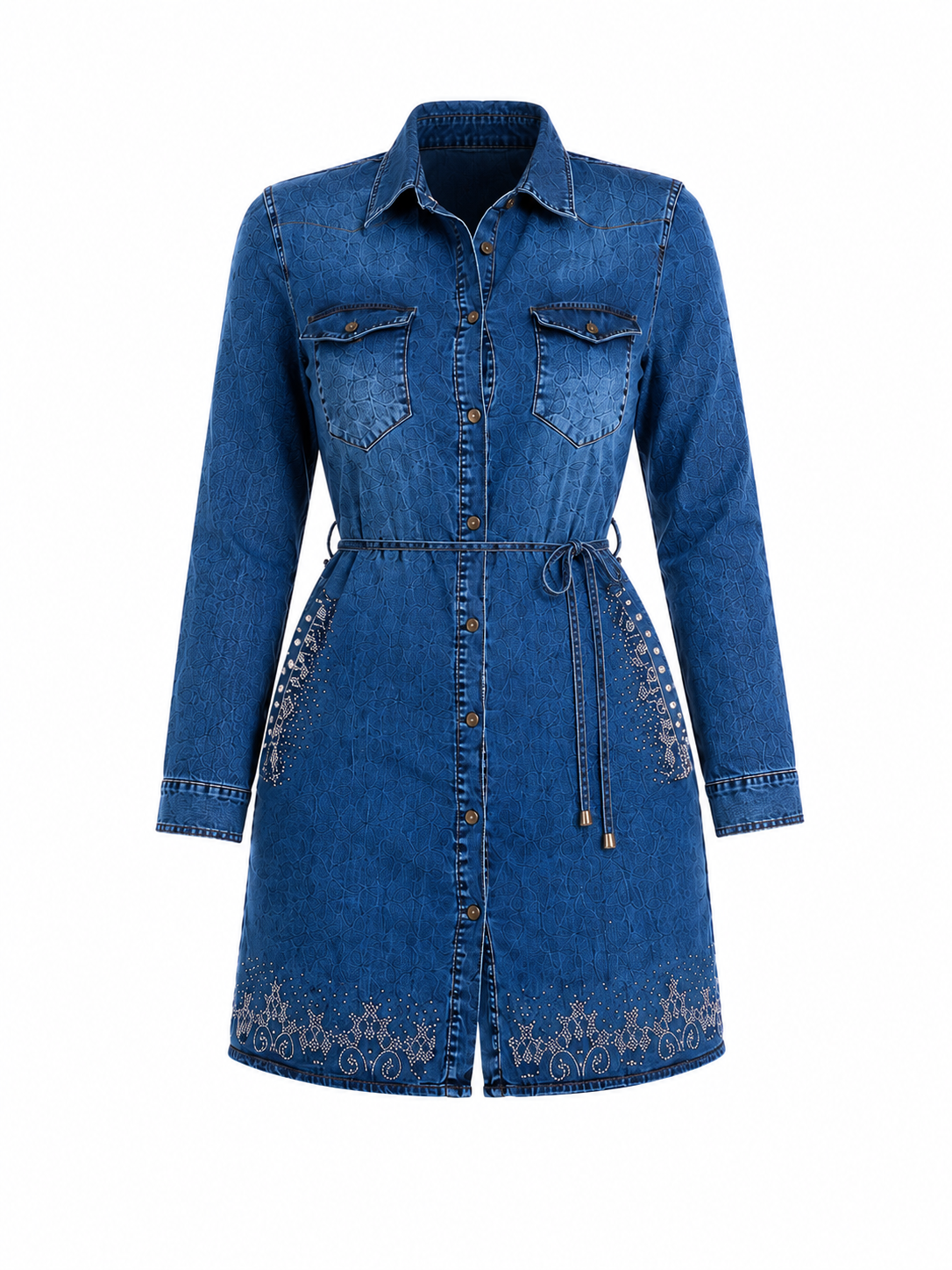 A blue denim shirt dress with long sleeves, a pointed collar, button-front closure, two chest flap pockets, a drawstring waist, and decorative floral embroidery near the hem and pocket areas, shown on a plain white background.