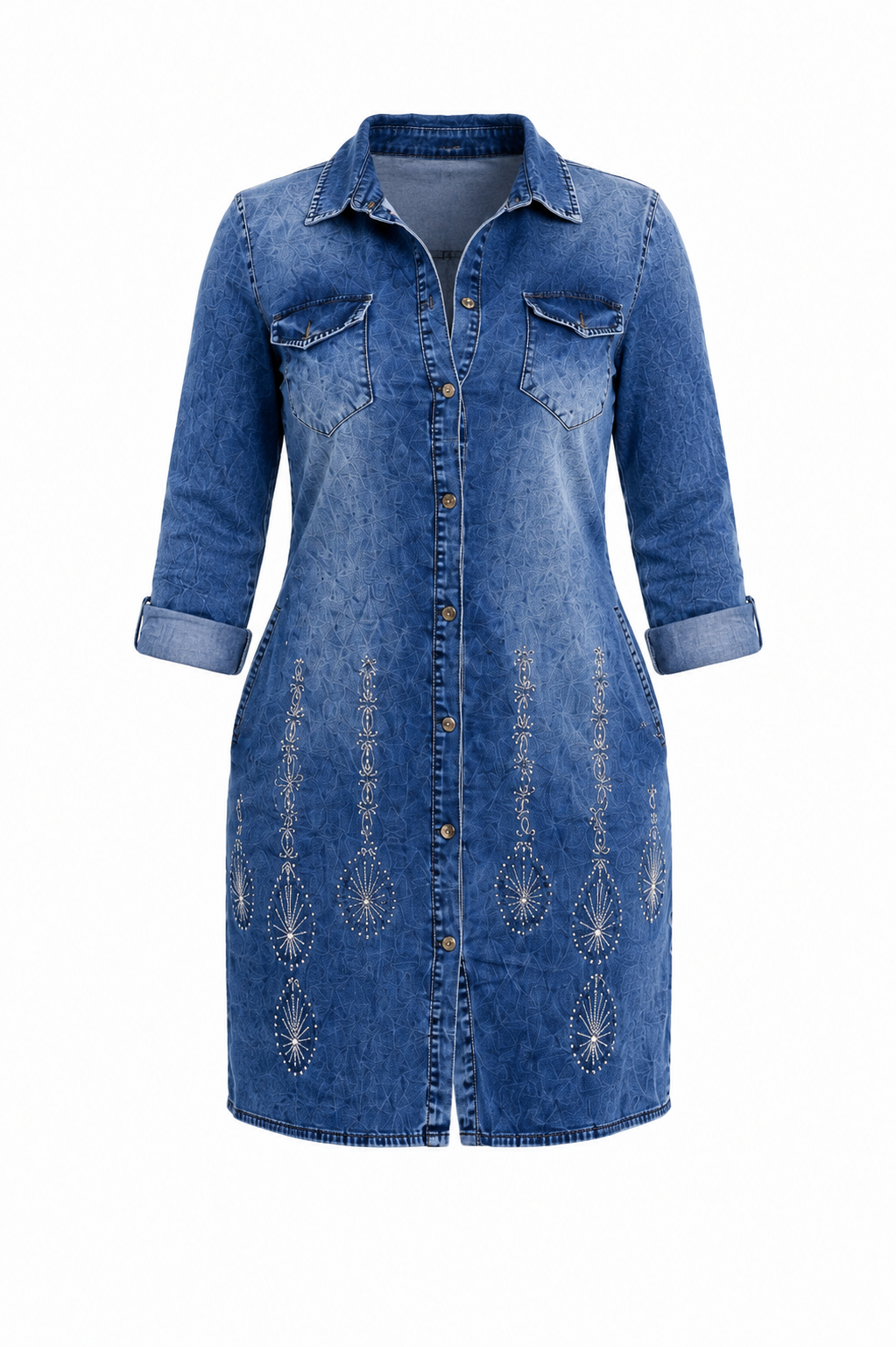 A blue denim shirt dress with three-quarter sleeves, button-front closure, chest flap pockets, and decorative embroidered patterns on the front, shown on a plain white background.