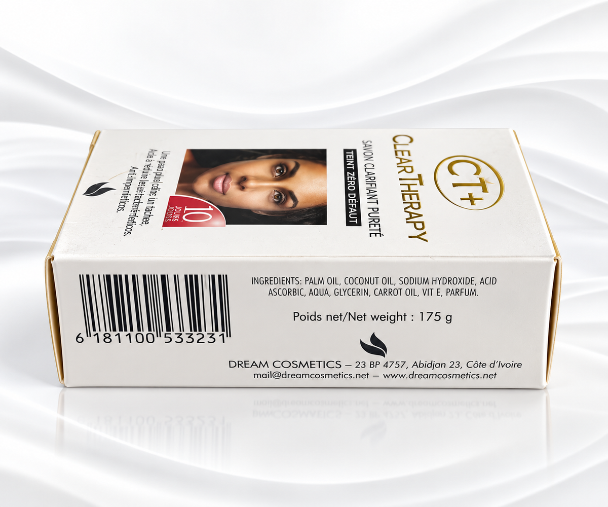 A white rectangular box of Dream Cosmetics Clear Therapy CT+ Skin Clarifying Gel, featuring a barcode, product details, and a model's face on the front, set against a white satin background with a soft reflection.