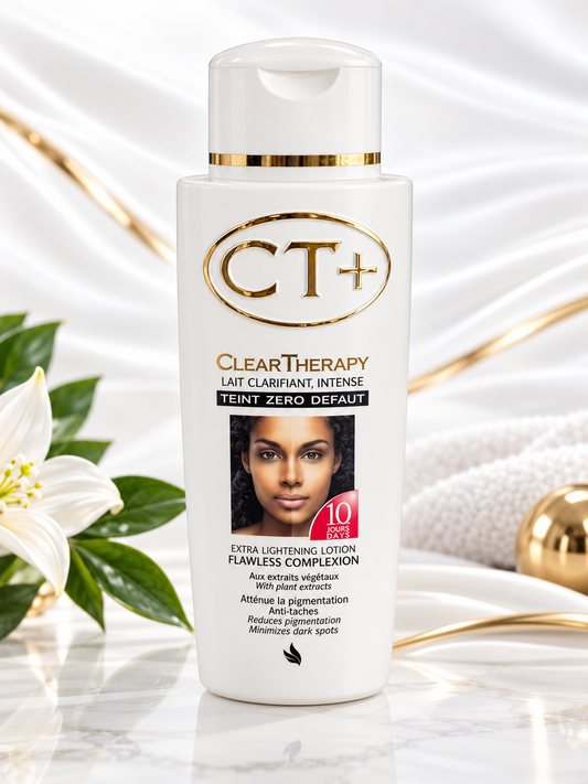 A bottle of ClearTherapy CT+ Teint Clarifiant Intense lightening lotion, shown on a marble surface with white satin fabric, gold accents, and a white lily flower.