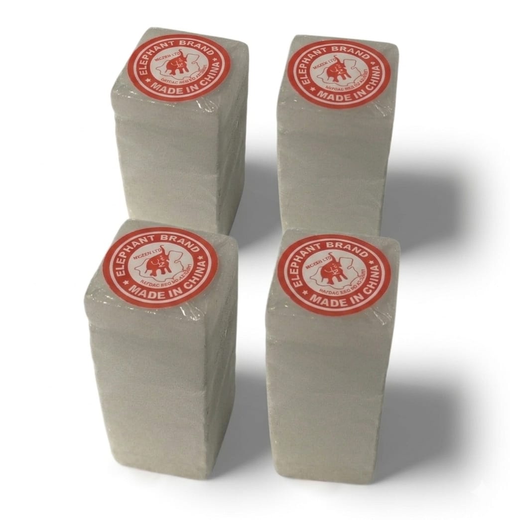 Four rectangular white blocks wrapped in clear plastic, each topped with a round red label reading 'Elephant Brand Made in China' with a white elephant logo, arranged in a 2x2 grid on a white background.
