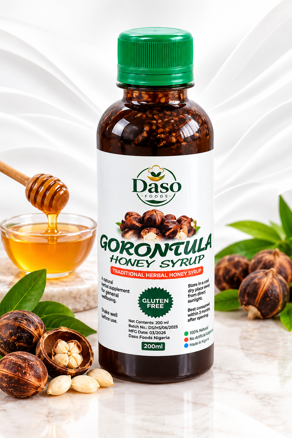 A bottle of Daso Local Gorontula Honey Syrup with a green cap and white label, surrounded by honey, a honey dipper, and fresh gorontula nuts on a marble surface with a white background.