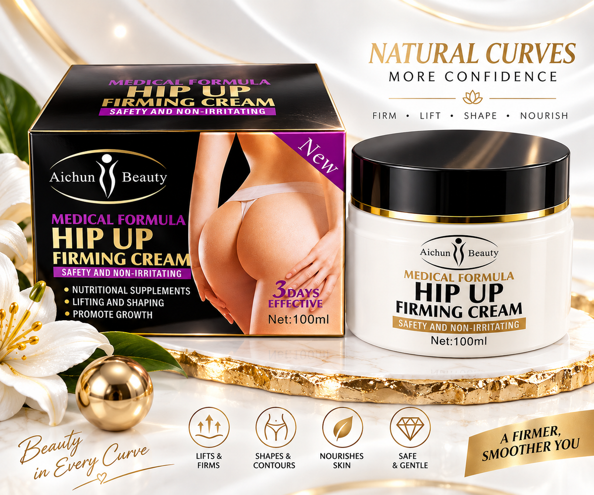 A jar and box of Aichun Beauty Medical Formula Hip Up Firming Cream are displayed on a gold tray with white flowers and a draped satin cloth. The packaging features black, purple, and white colors with gold accents, and the jar has a white body with a black lid and gold trim.