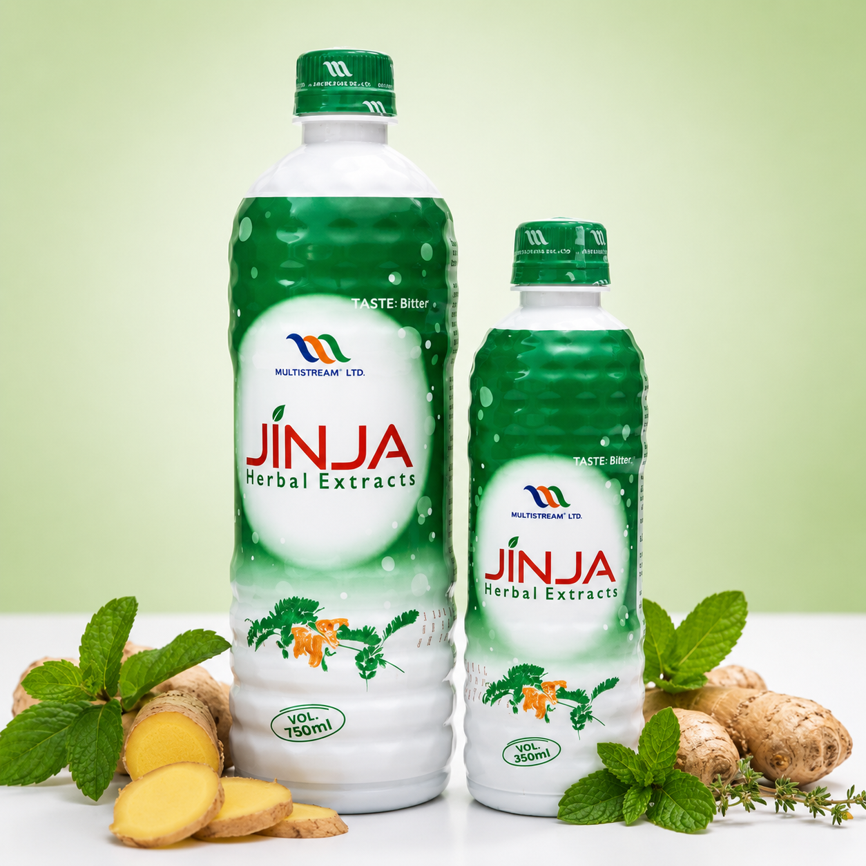 Two bottles of Multistream Jinja Herbal Extracts, one large and one small, styled with fresh mint leaves, ginger roots, and sliced ginger on a white surface against a light green background.