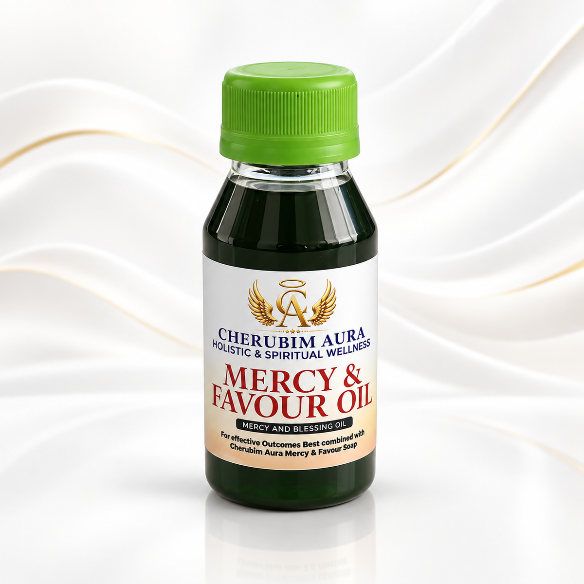 A bottle of Cherubim Aura Mercy & Favour Oil with a bright green cap and a white label, set against a clean white background with elegant gold wavy lines.