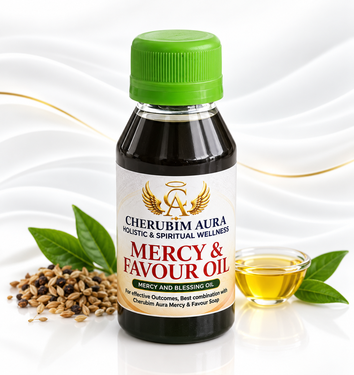 A bottle of Cherubim Aura Mercy & Favour Oil with a green cap, set against a white background with decorative leaves, seeds, and a small glass of the golden oil.