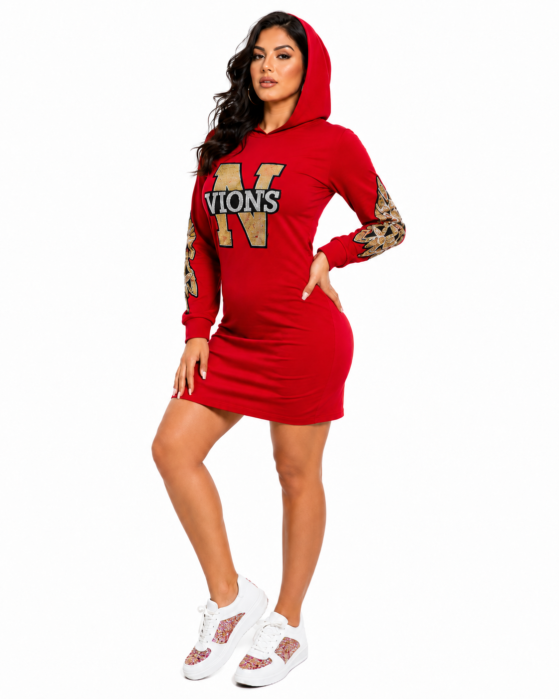A woman modeling a red hooded mini dress with a large gold and black 'N VIONS' graphic on the front and leopard-print patterned sleeves, paired with white sneakers against a plain white background.