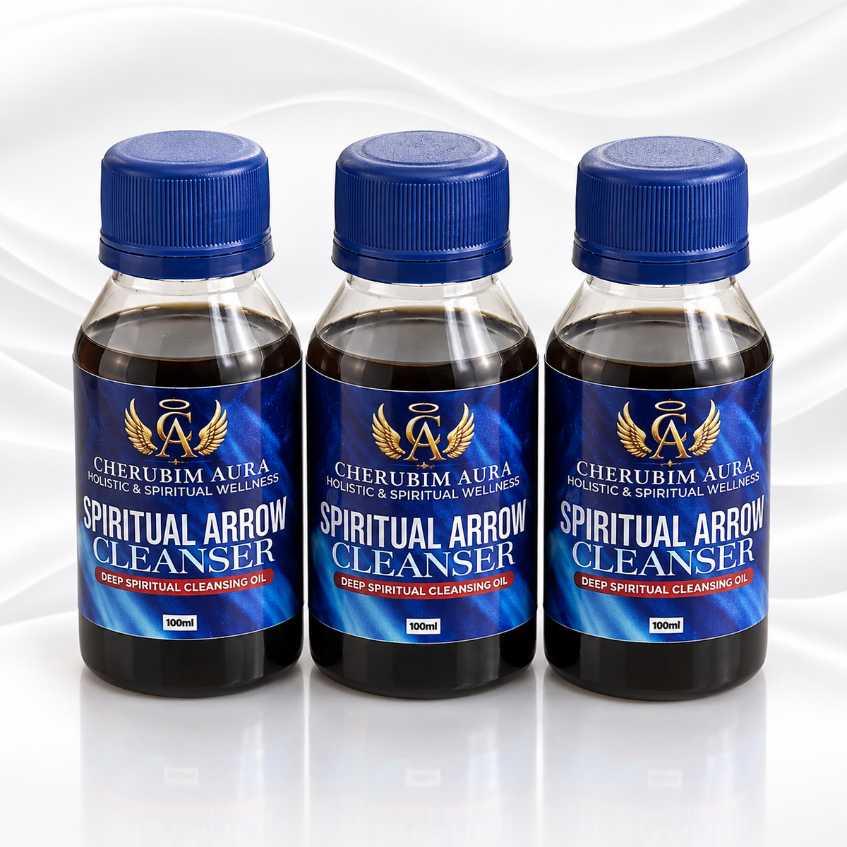 Three 100ml bottles of Cherubim Aura Spiritual Arrow Cleanser arranged in a row on a reflective white surface with a light gray background.