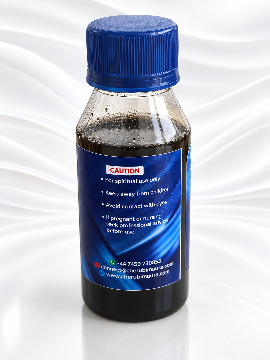 A small clear bottle with a blue cap and a blue label containing dark brown liquid, photographed on a white background with a wavy graphic design.