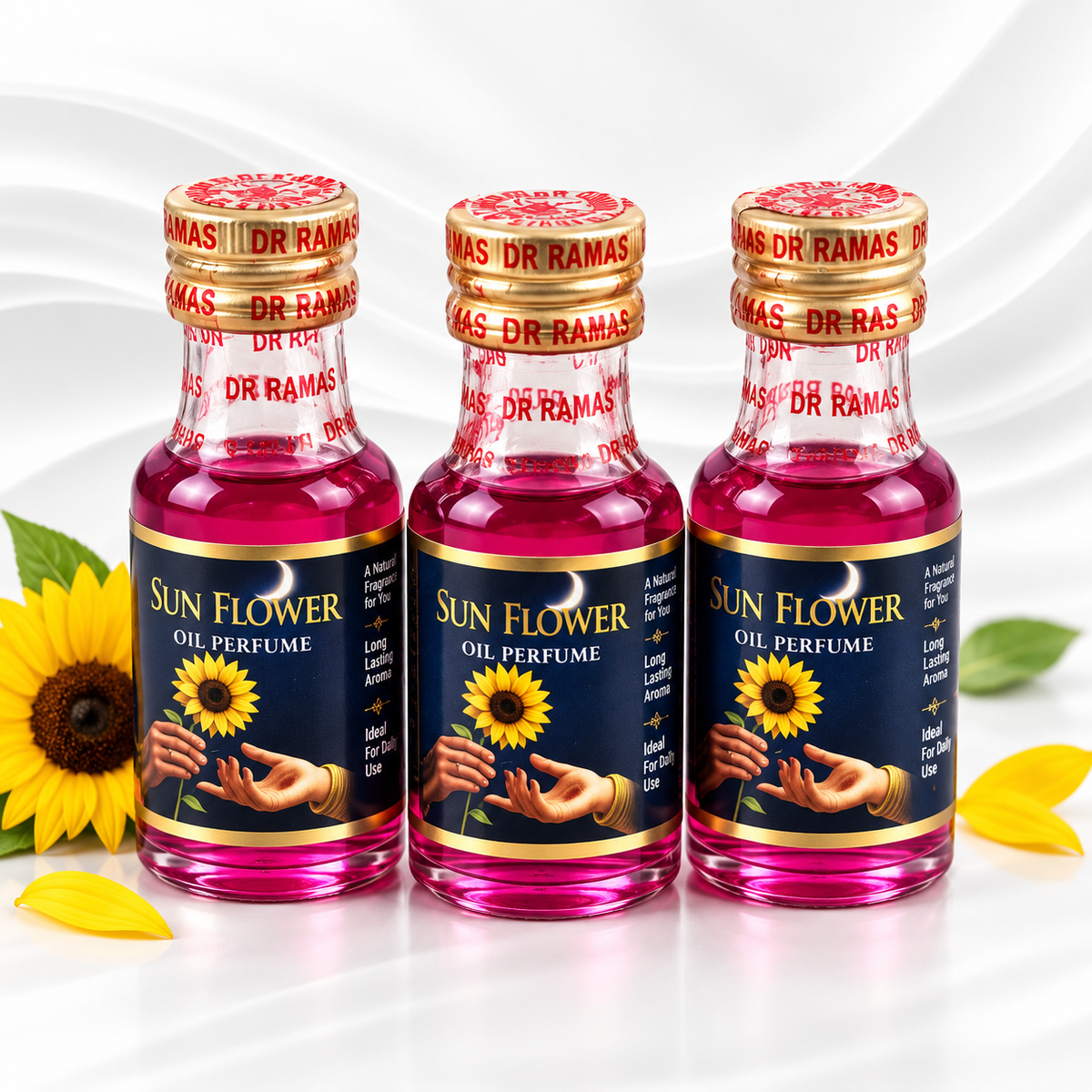 Three bottles of Dr. Ramas Sun Flower Oil Perfume arranged side by side on a white background with decorative yellow flowers and leaves.