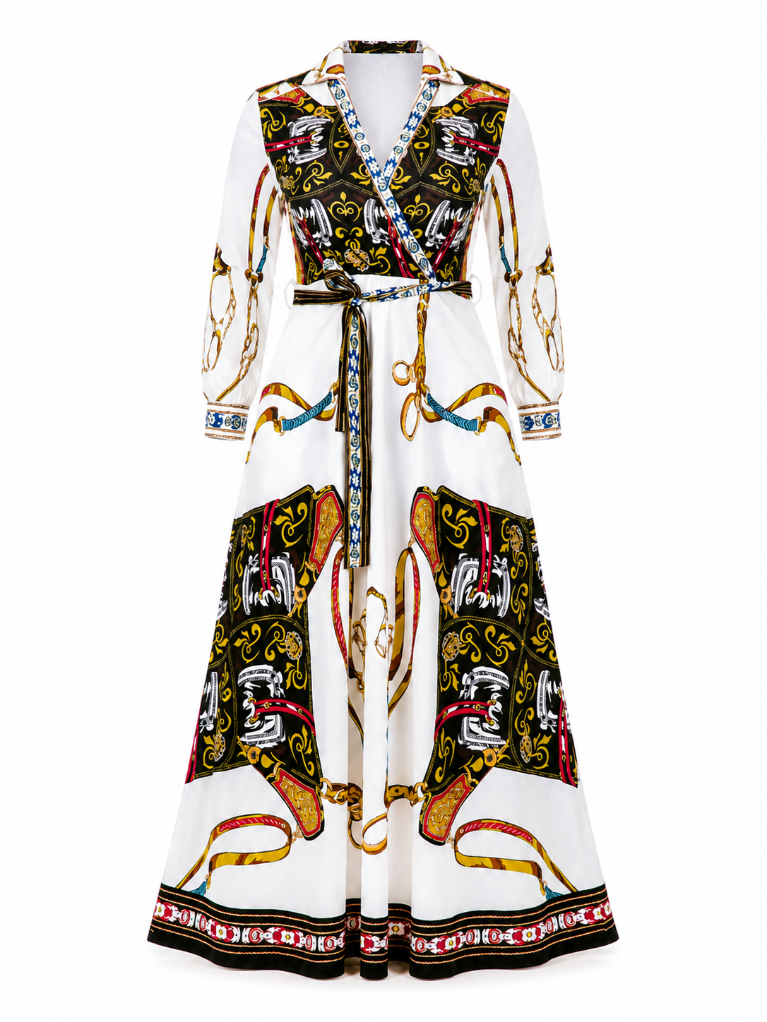 A long white wrap dress featuring a bold multicolor print with black, gold, red, and blue elements, including chain motifs and ornate scrollwork, complete with a matching tie belt.